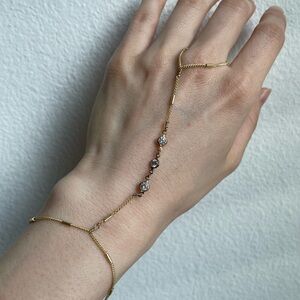 Hand chain bracelet